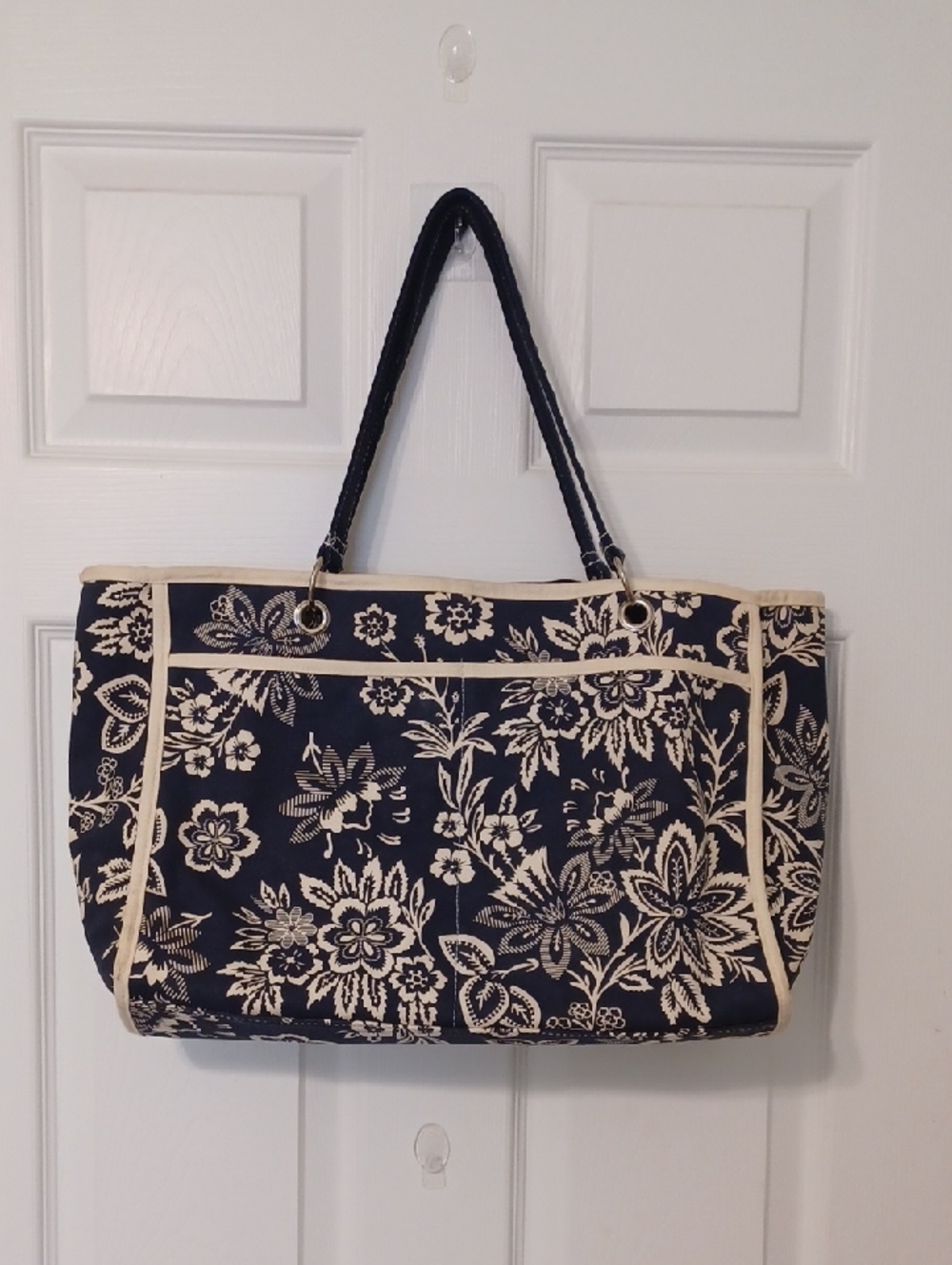 Navy Floral, Canvas Tote Bag with Cream Trim. 4 Outside Pockets.